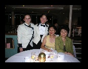 Mileana, our assistant waitress from Bulgaria, Sheilo, our waitress from Philippines, Shu Fong, and Angie at our last dinner on board the Norwegian Dream.